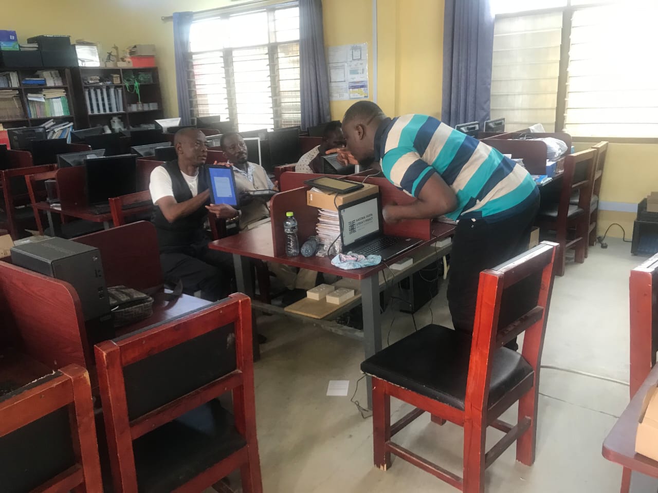 Louis Addor supporting a National Digital Literacy Project computer lab session