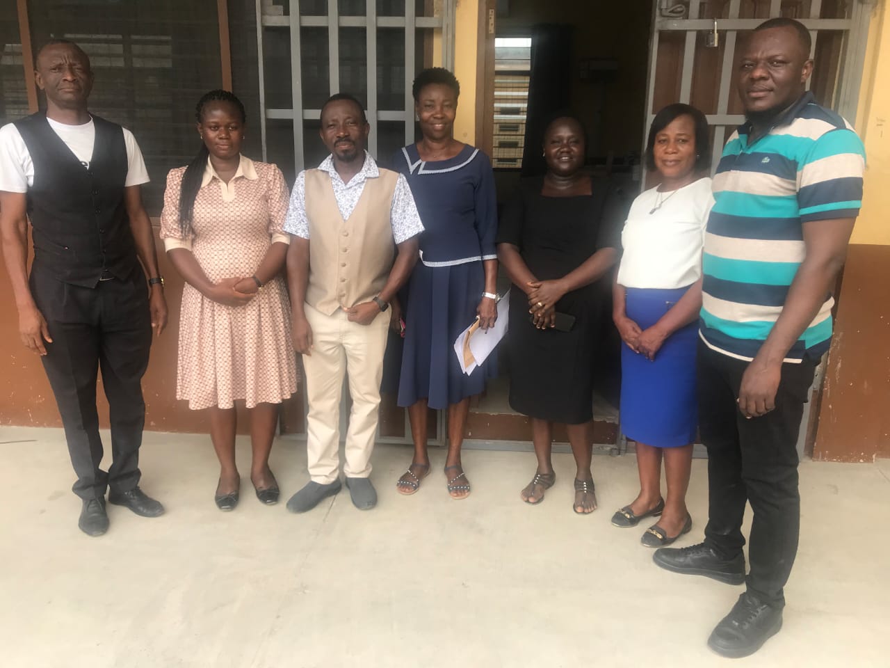 Louis Addor with school staff and community partners